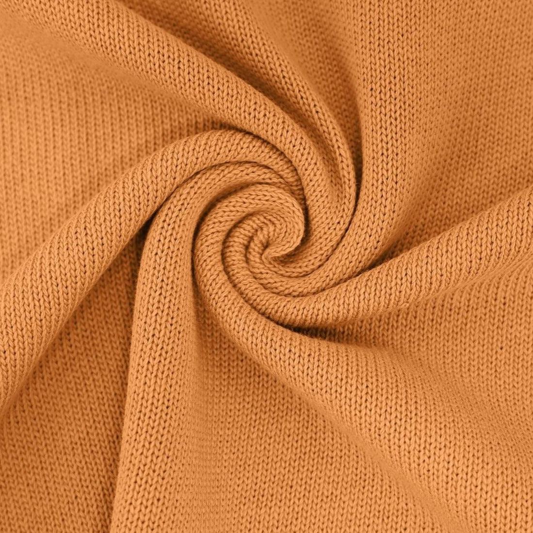 Orange knit store fabric